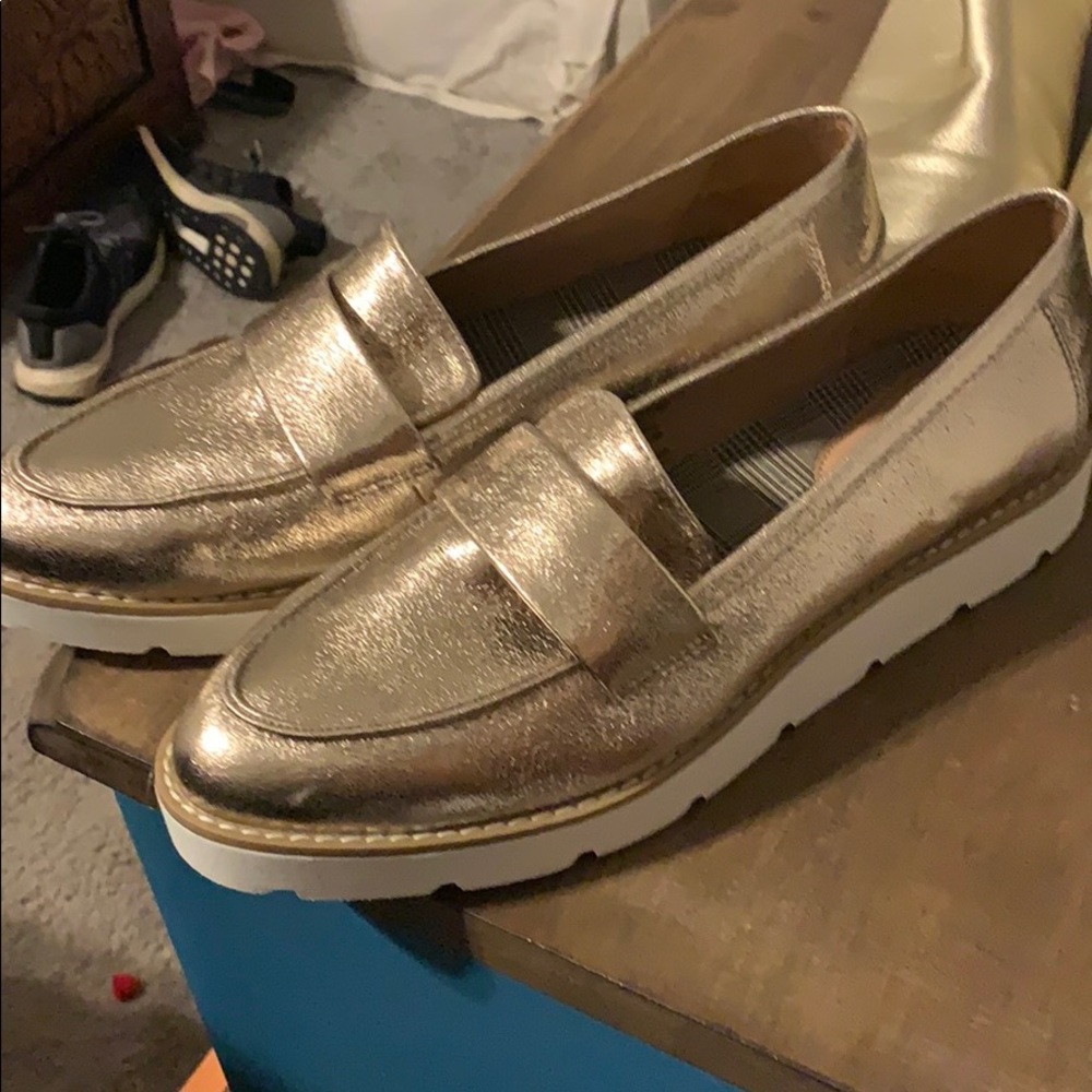 Never worn gold loafers